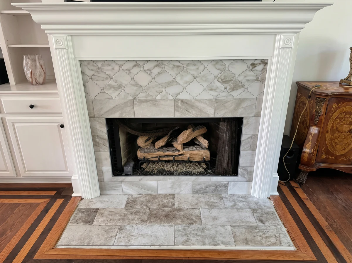 Luxury fireplace tile and hearth flooring completed by Paez And More